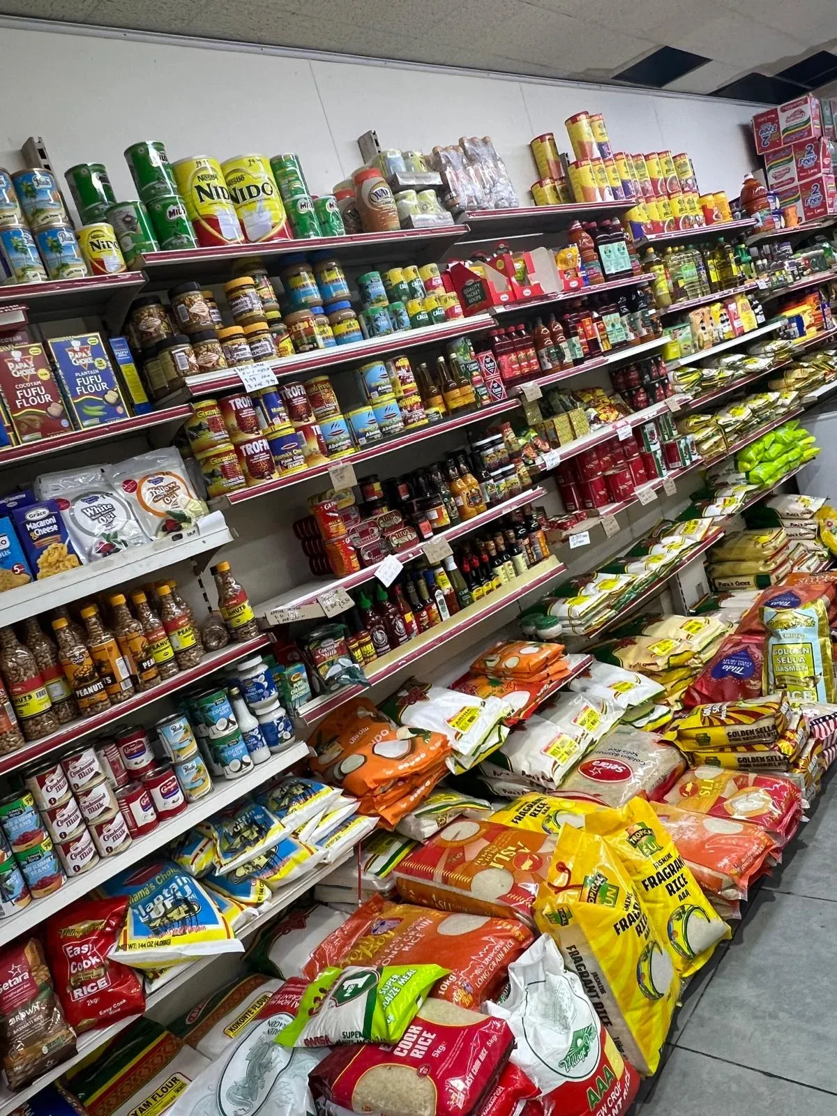 The grocery shelves inside Bedford Fresh Fish & Seafoods